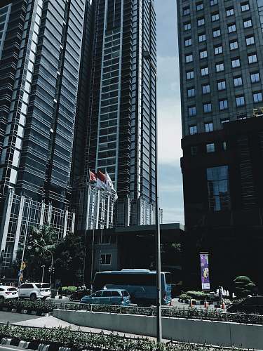 office building vehicle passing through the building city